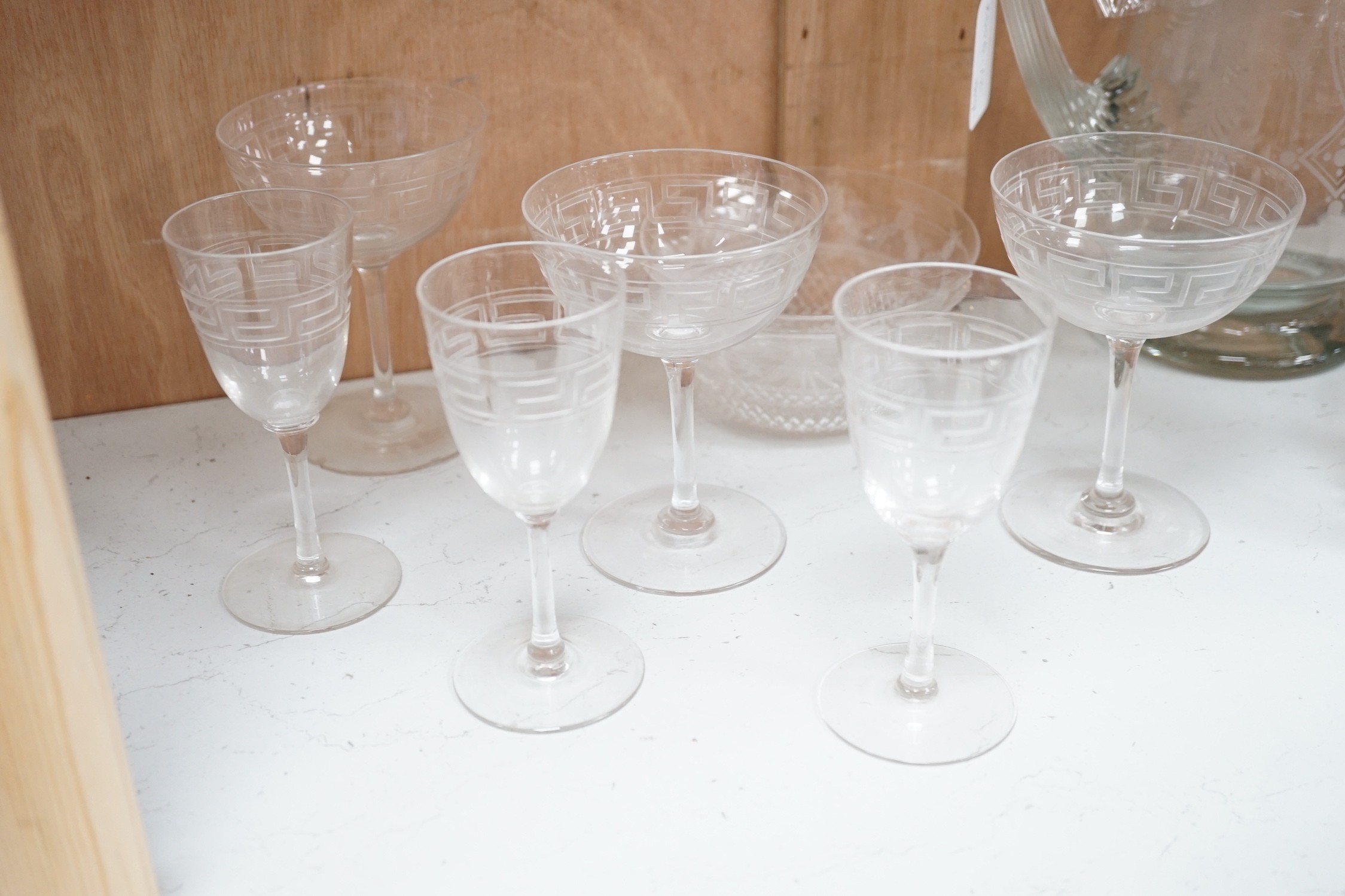 A selection of various engraved glassware, together with a cut glass decanter and stylish jug. Tallest 25cm